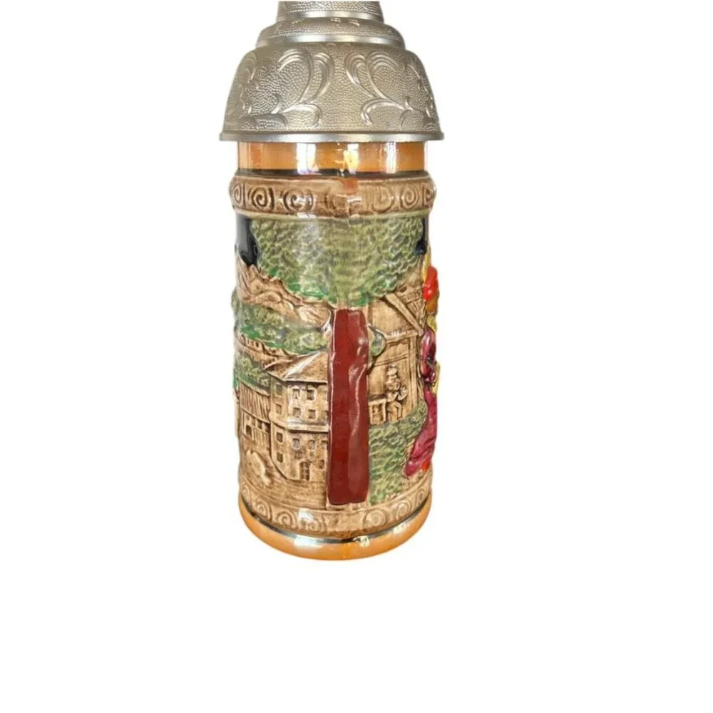 Vintage German musical beer stein,  embossed painted scenes, hinged pewter lid
